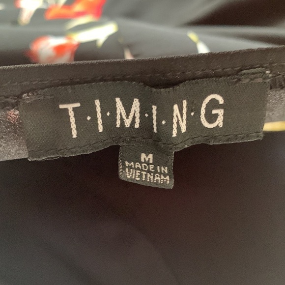 Floral Sleeveless Faux Wrap High Low Romper Dress - Picture 7 of 8